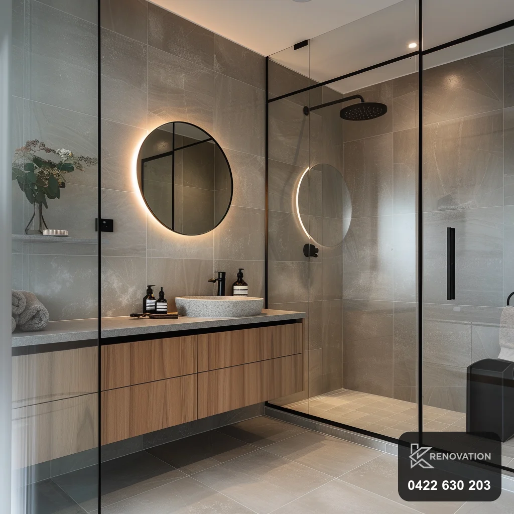 Bathroom with black-framed shower screen in a Seddon renovation by KRenovation