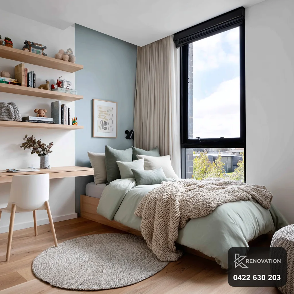 Bedroom with built-in desk and shelving in a Spotswood renovation by KRenovation