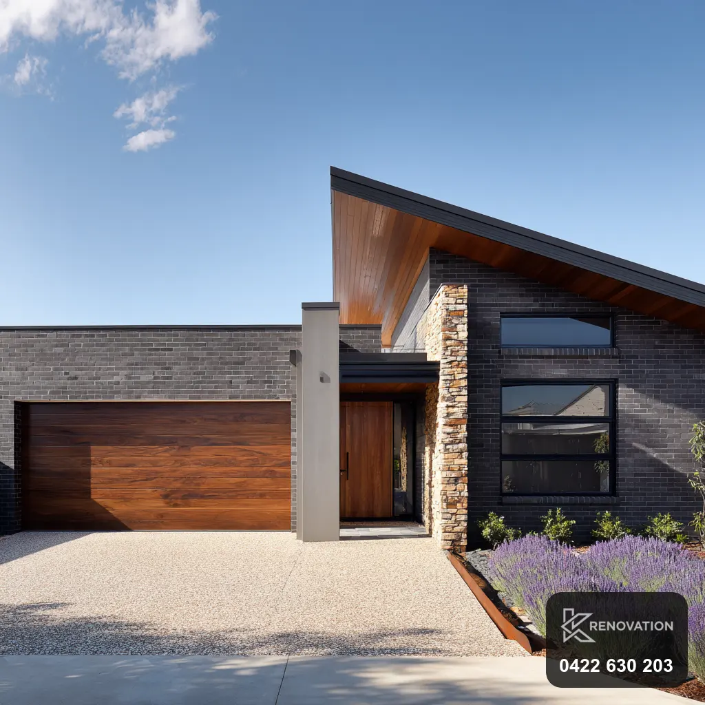Renovated angular modern home with timber and dark roof by KRenovation