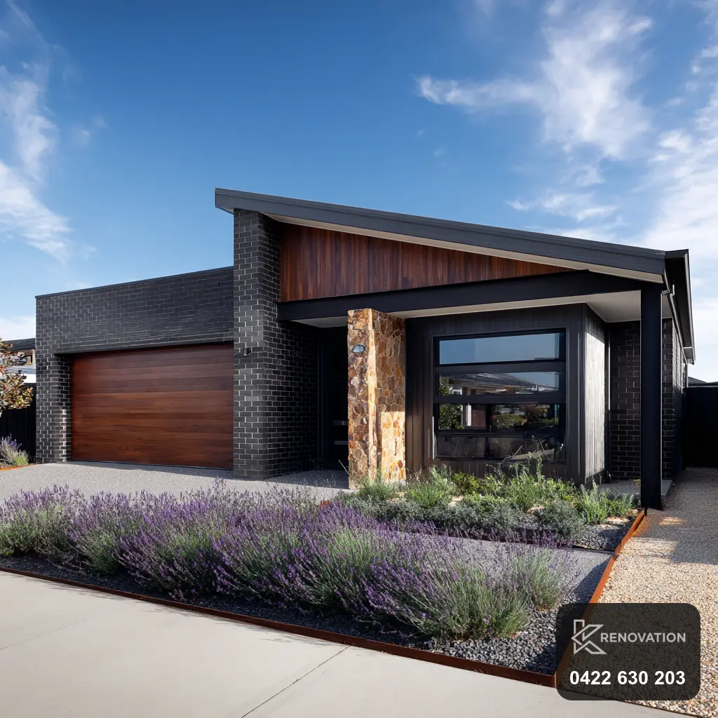 Renovated modern home with dark cladding, timber and a lavender garden by KRenovation