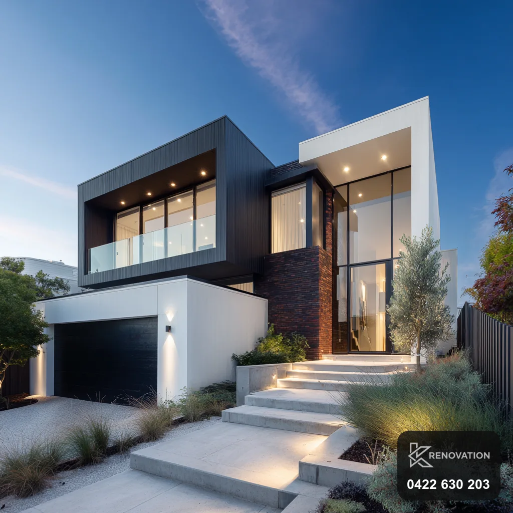 Dark render facade with garage and concrete steps by KRenovation
