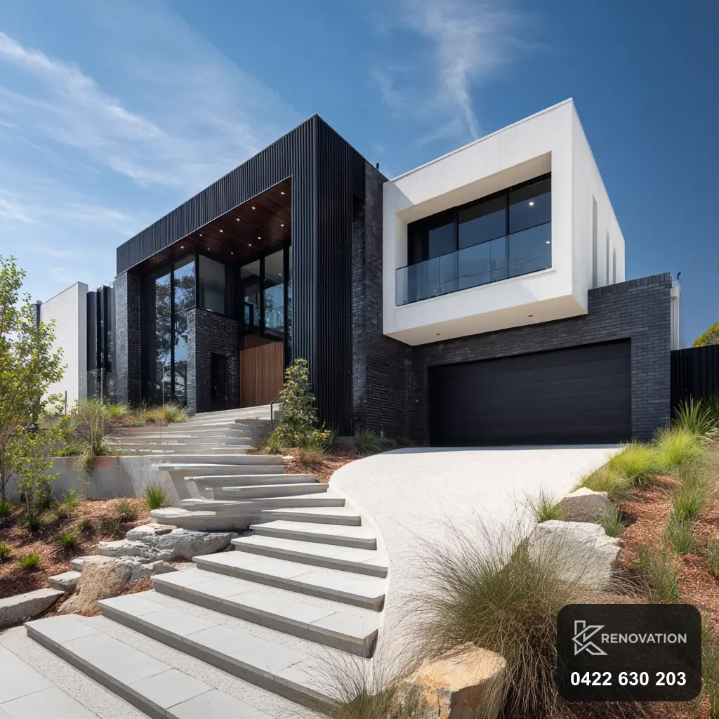 Renovated dark and white home with garage and steps by KRenovation