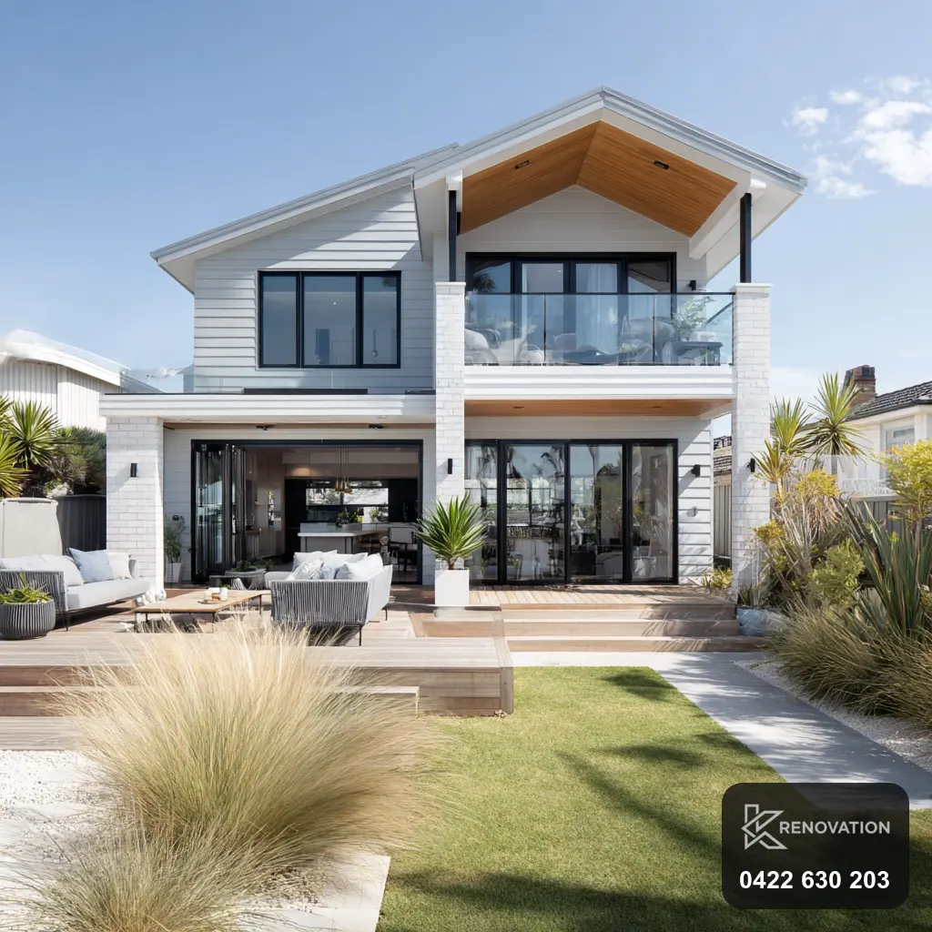 Renovated home facade with timber feature in Newport by KRenovation