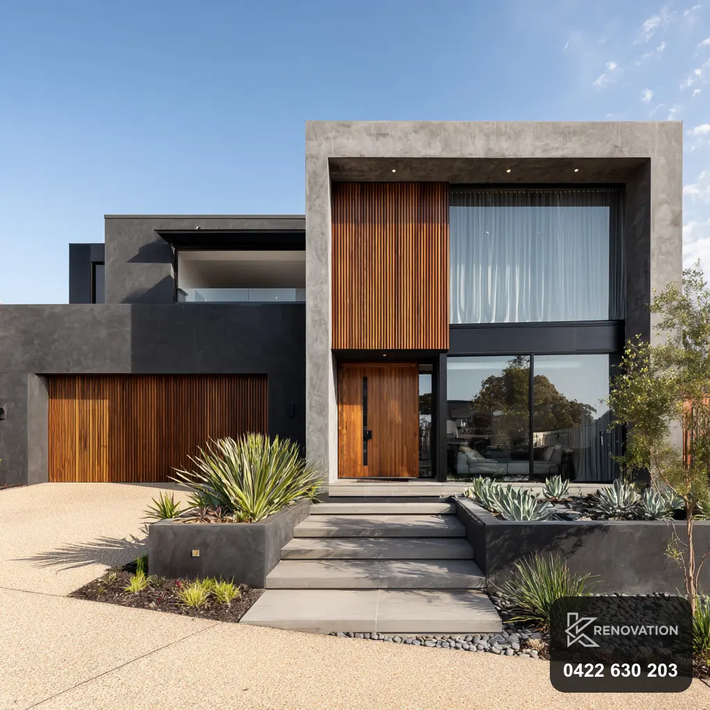 Finished two-storey home extension in timber and dark cladding with landscaping by KRenovation