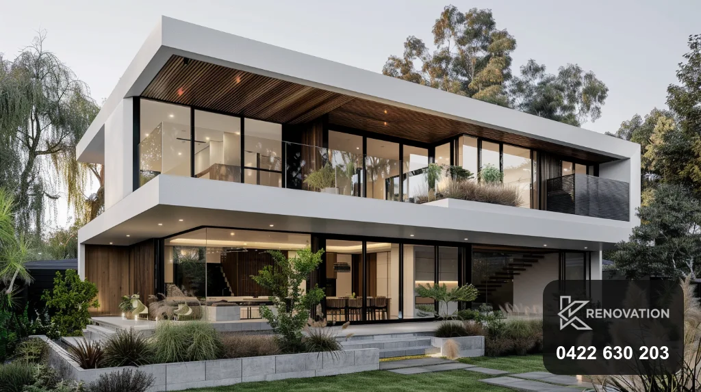 Finished two-storey home renovation in timber and grey at dusk by KRenovation