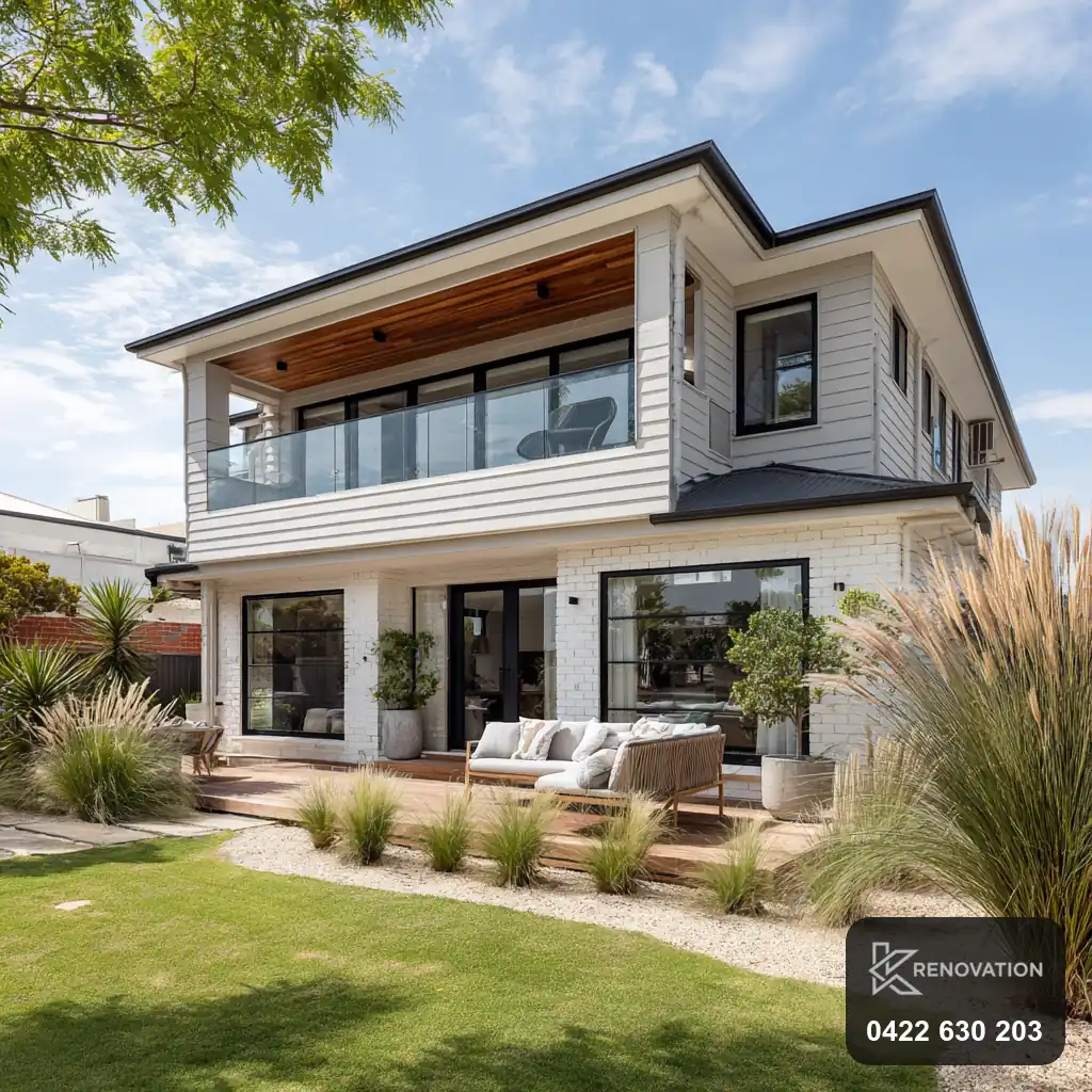 Renovated home facade with timber and render in Footscray by KRenovation