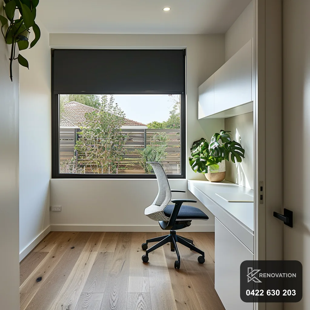 Renovated home office and study with a built-in desk, window and greenery by KRenovation