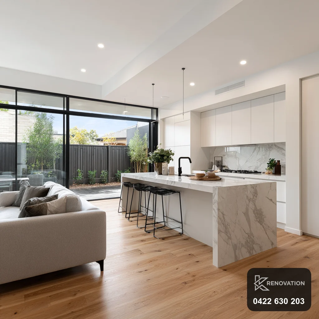 Open-plan living and kitchen opened to the rear of a Seddon terrace by KRenovation