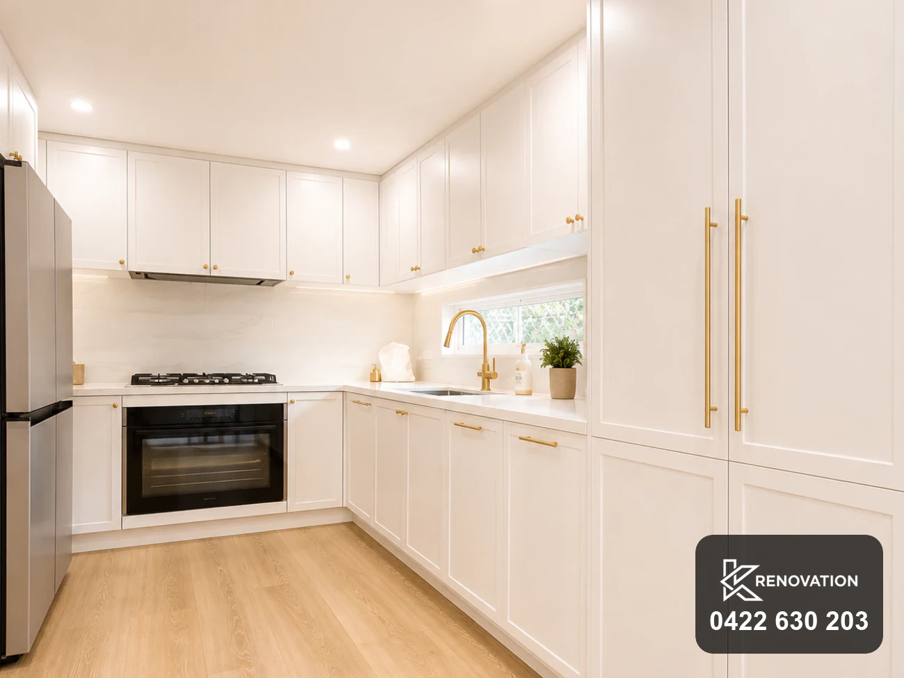 Full height cabinetry with brass handles in the Bulleen renovation