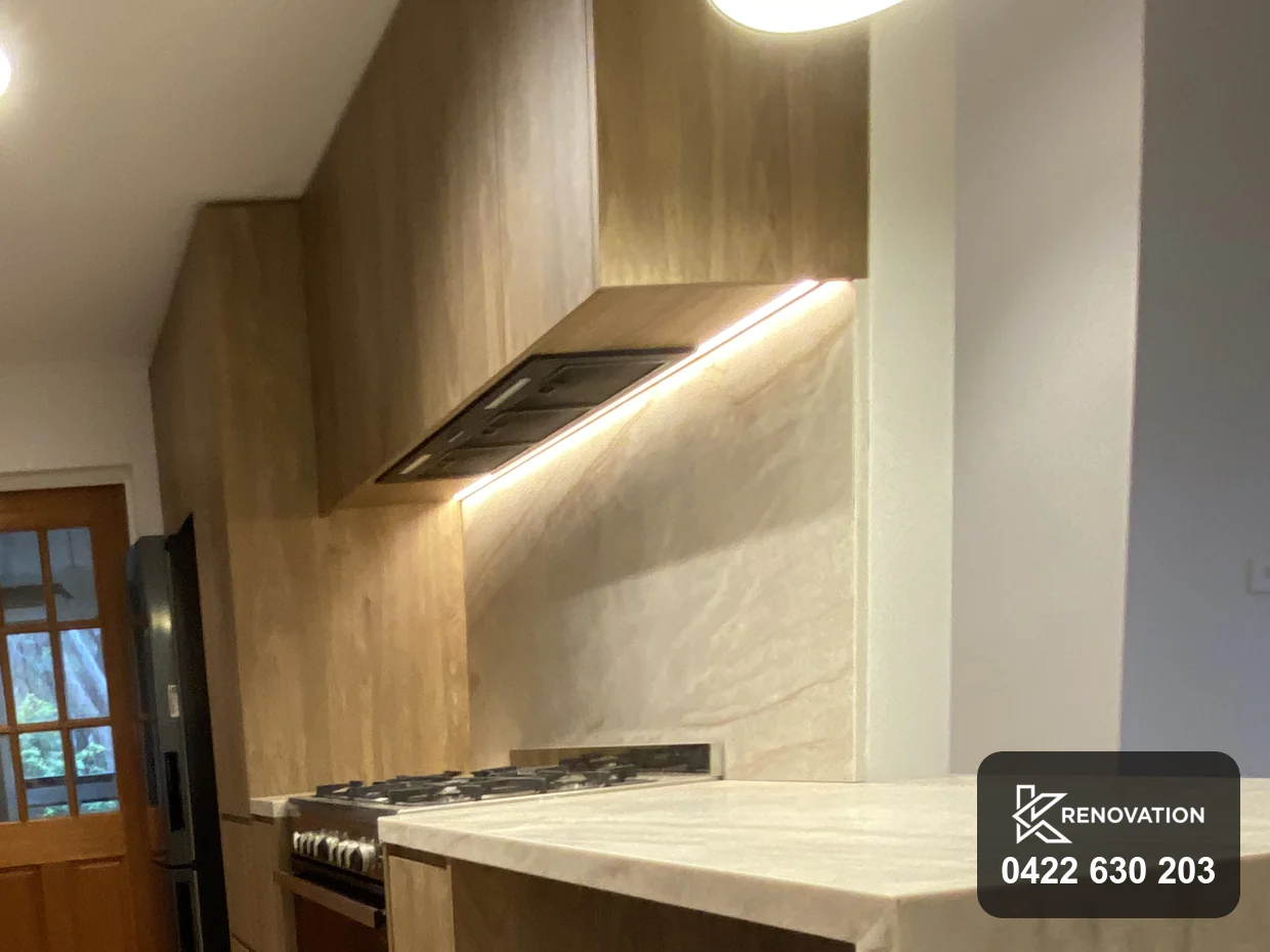 Cabinetry meeting the raked ceiling line in an Essendon renovation
