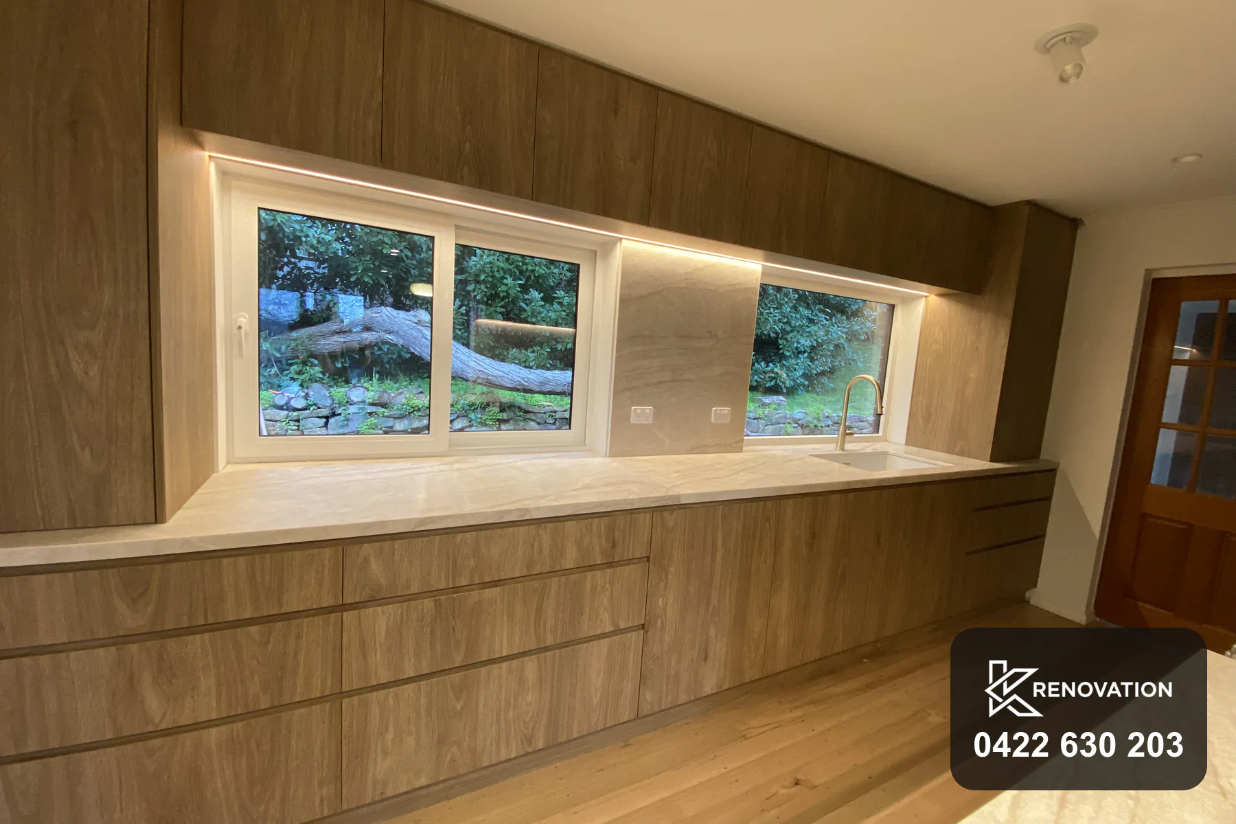 Completed Essendon home renovation with an oak kitchen and stone benchtops