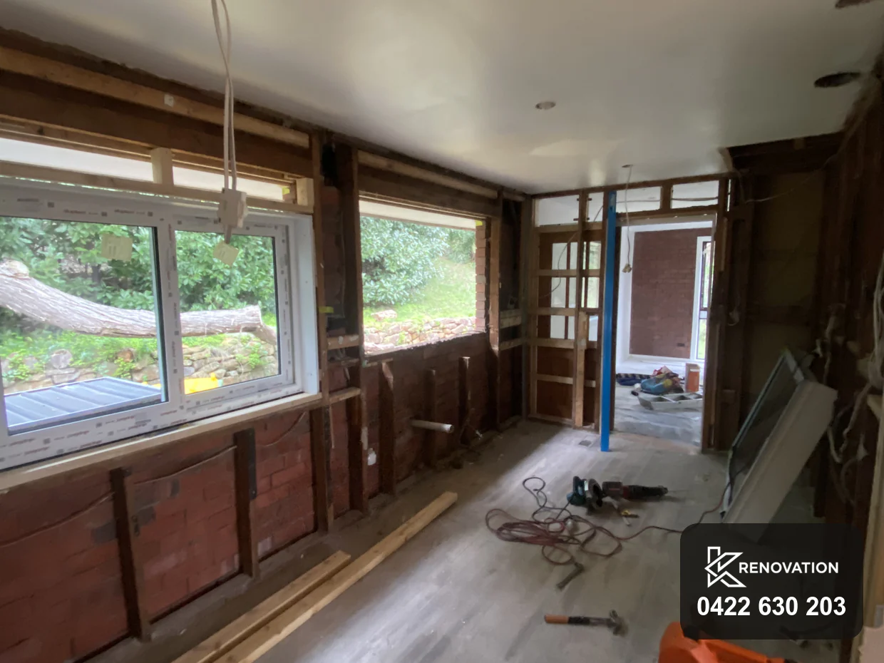 Essendon renovation with steel props supporting the ceiling and walls stripped to brick
