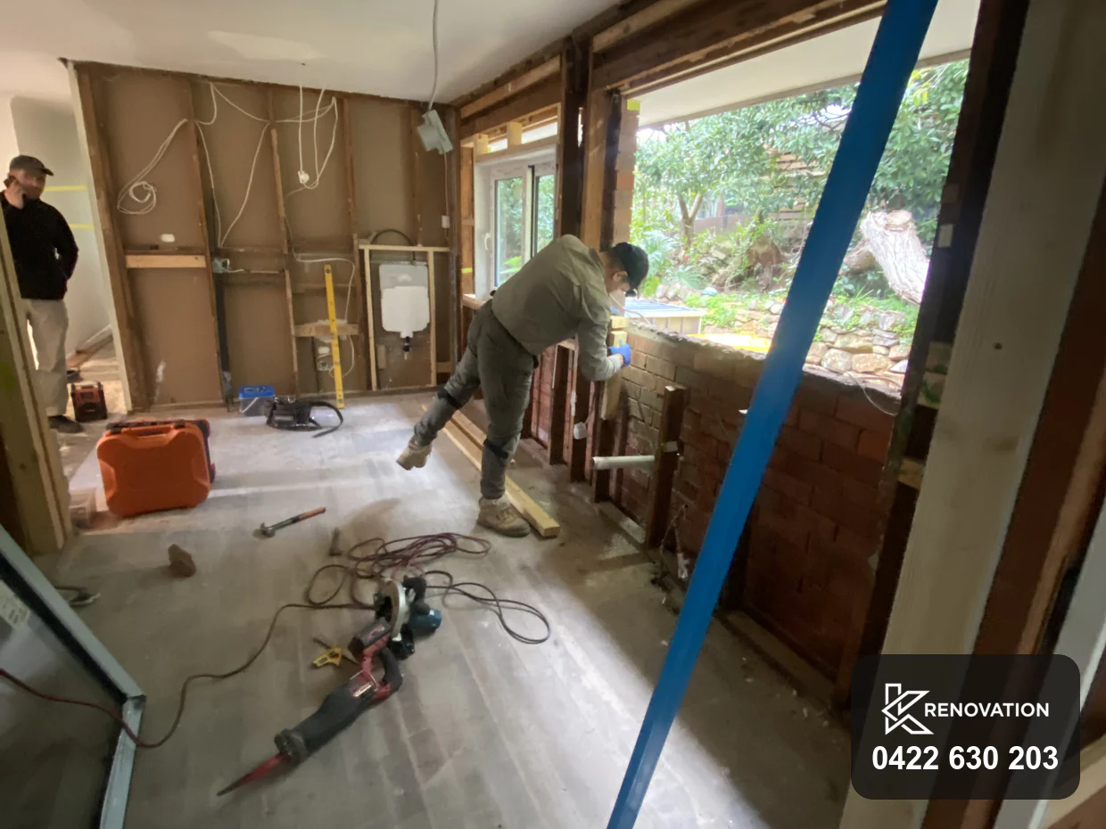 Timber wall framing and reframed window openings during an Essendon renovation
