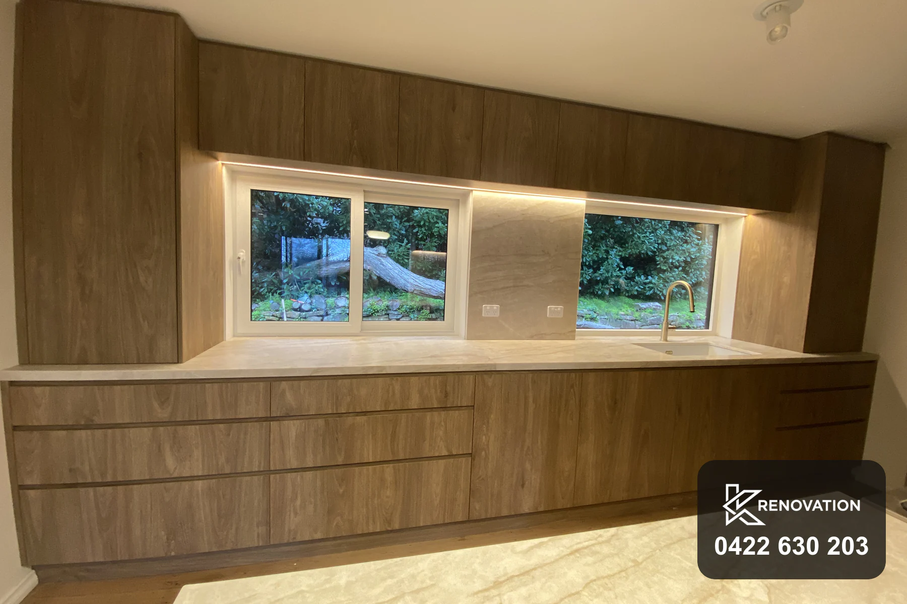 Home renovation in Essendon with a rebuilt oak and stone kitchen
